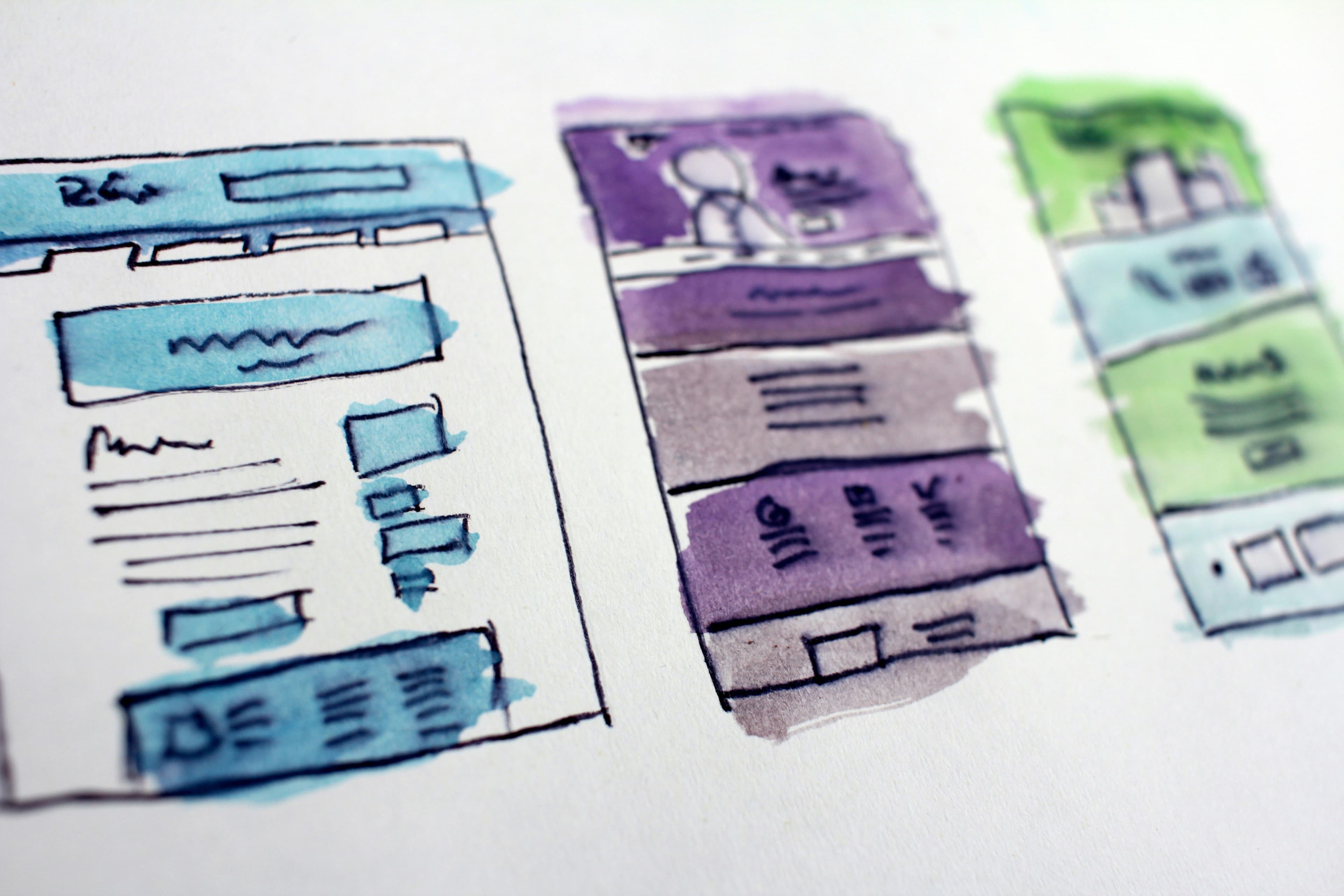 Three hand-drawn and colorful wireframes in a row
